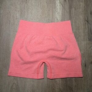 Pink high-waisted workout shorts with built-in shorts